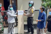 Pemasangan Tanda Isolasi, Team Tracer PPKM di Dampingi Babinsa Jurai