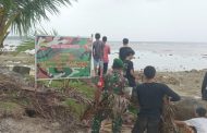 Babinramil 03 Sipora Monitoring Kondisi Cuaca dan Pemasangan Spanduk Himbauan
